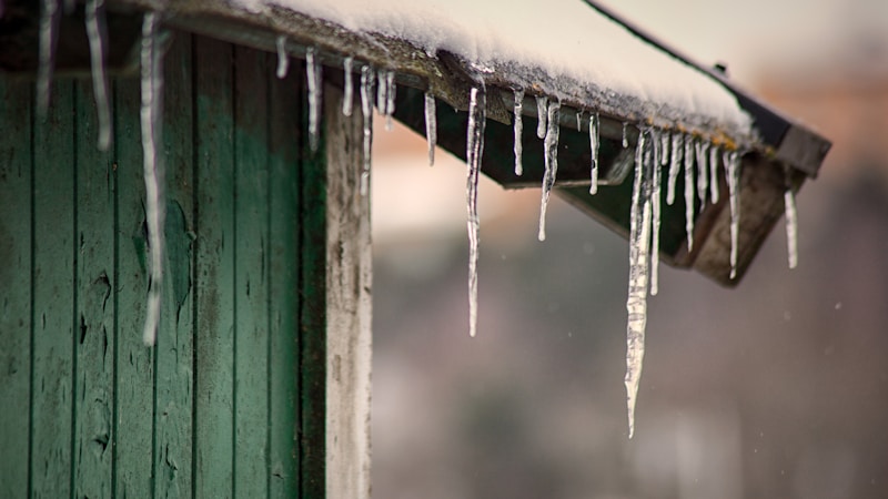 Ice dam roof leak water damage repair in Akron, OH — IICRC-certified emergency restoration (representative photo)